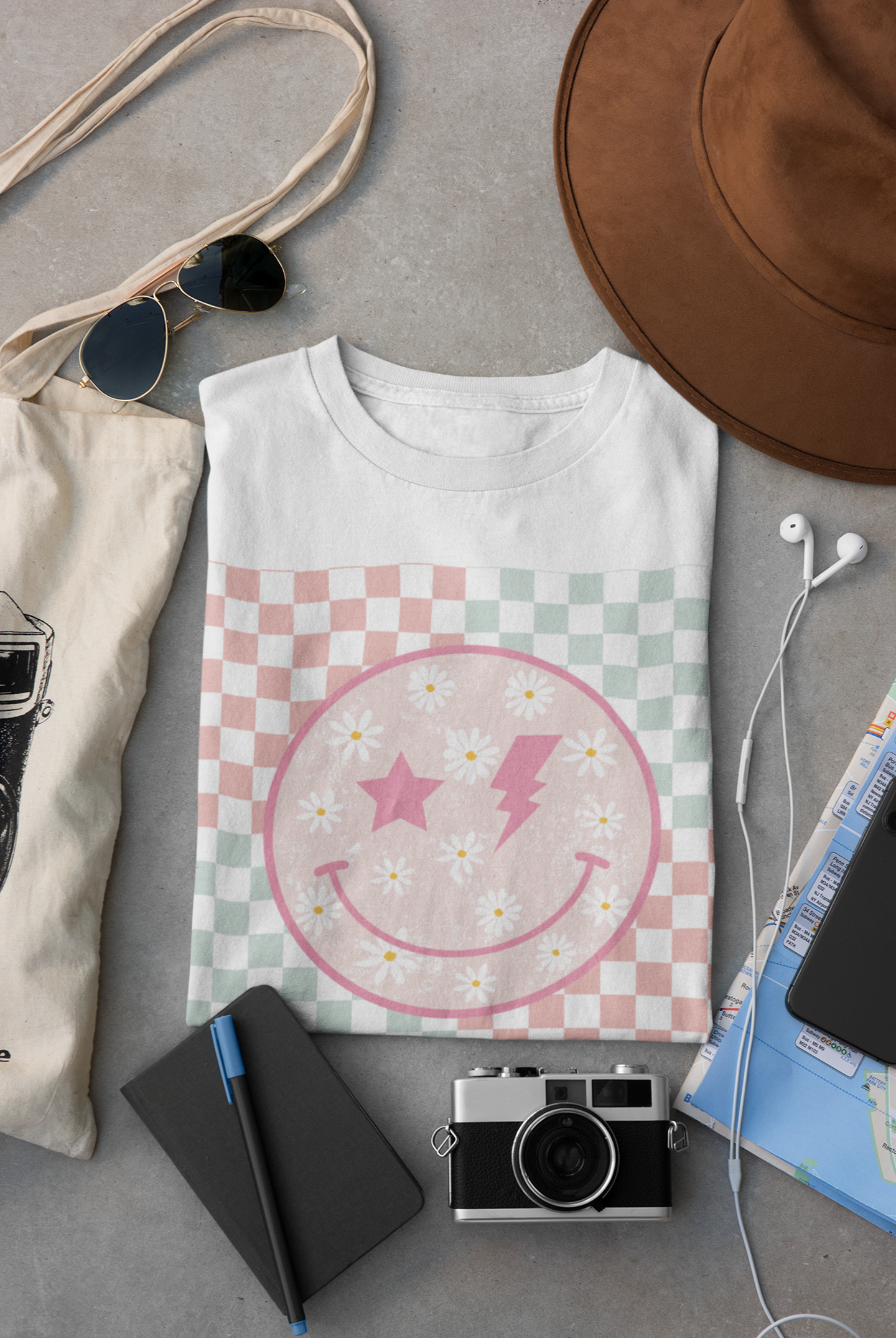 Close-up of floral smiley and checkered design.
