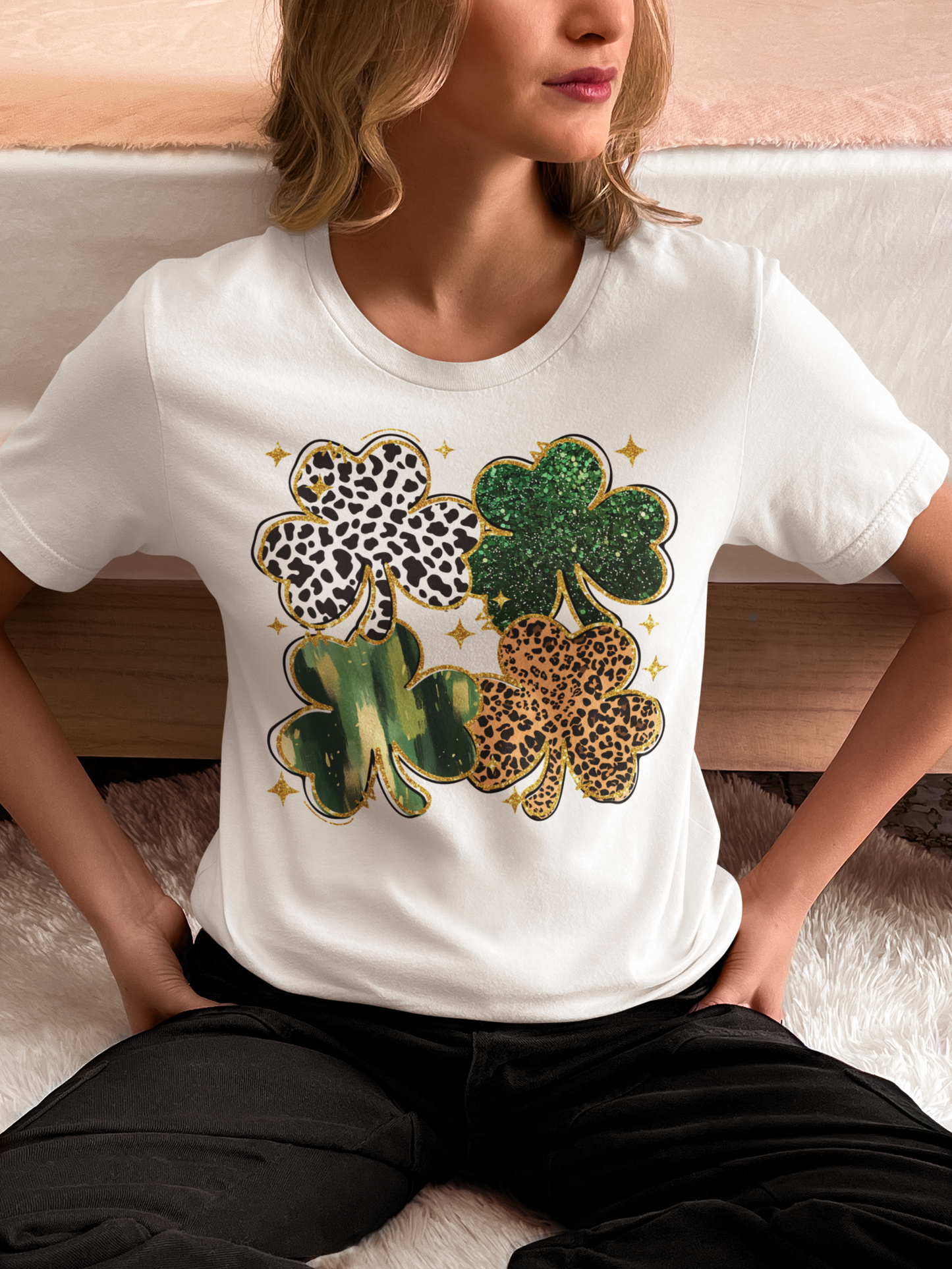 Close-up of shamrock patterns on a festive graphic tee.